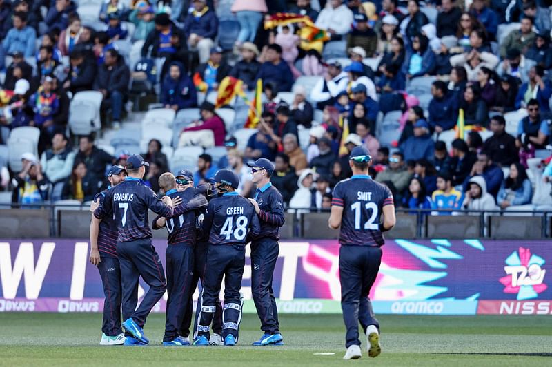 Namibian players celebrate the wicket of Sri Lanka's Bhanuka Rajapaksa during the Australia 2022 Twenty20 World Cup cricket tournament match between Sri Lanka and Namibia at Kardinia Park in Geelong on 16 October, 2022.