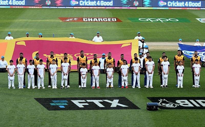 Team Sri Lanka line up for the national anthems during the ICC men’s Twenty20 World Cup 2022 cricket match between Sri Lanka and United Arab Emirates at Kardinia Park in Geelong on 18 October, 2022.