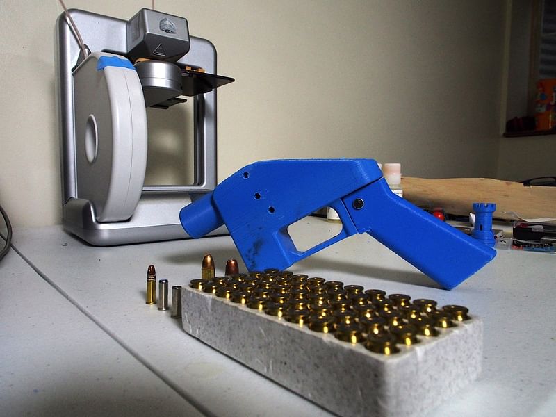 In this file photo taken on 11 July, 2013, a Liberator pistol, first firearm that can be made entirely with plastic components forged with a 3D printer and computer-aided design (CAD) files downloaded from the Internet