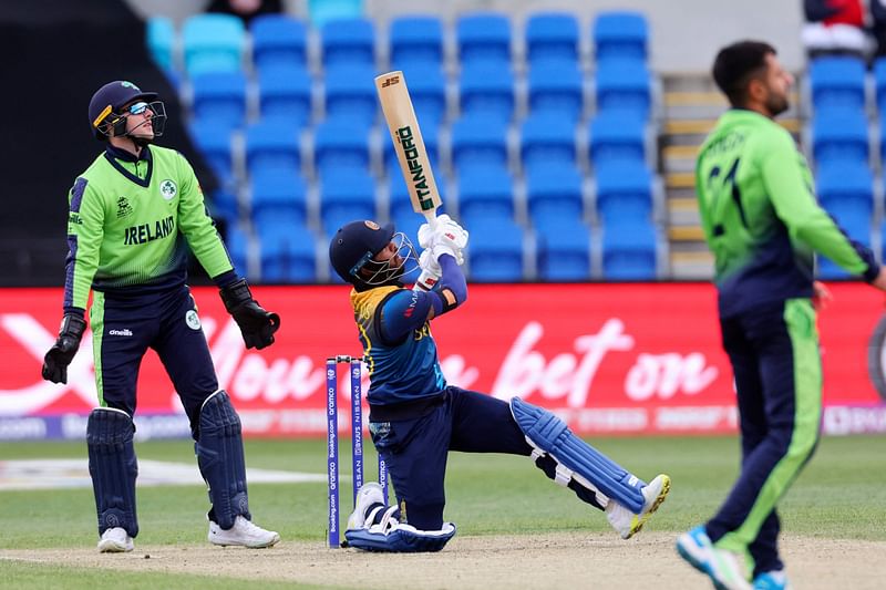 Sri Lanka's Kusal Mendis plays a shot over the boundary line for six runs to win the ICC men's Twenty20 World Cup 2022 cricket match between Sri Lanka and Ireland at Bellerive Oval in Hobart on 23 October, 2022