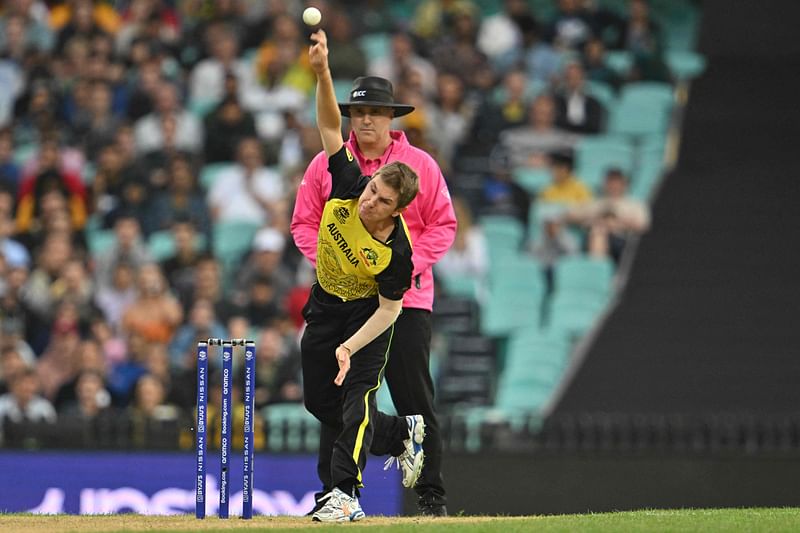 Australia's Adam Zampa bowls during the ICC men’s Twenty20 World Cup 2022 cricket match between Australia and New Zealand at the Sydney Cricket Ground (SCG) in Sydney on 22 October, 2022