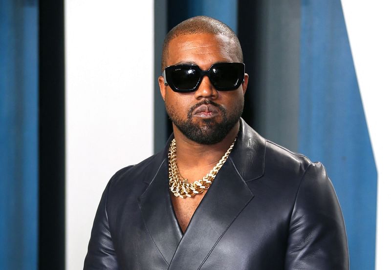 In this file photo taken on 10 February, 2020 Kanye West attends the 2020 Vanity Fair Oscar Party following the 92nd annual Oscars at The Wallis Annenberg Center for the Performing Arts in Beverly Hills. Paris-based fashion house Balenciaga has ended ties with rapper Kanye West following a recent run of controversial statements, including an outburst denounced as anti-Semitic, according to fashion news site WWD.