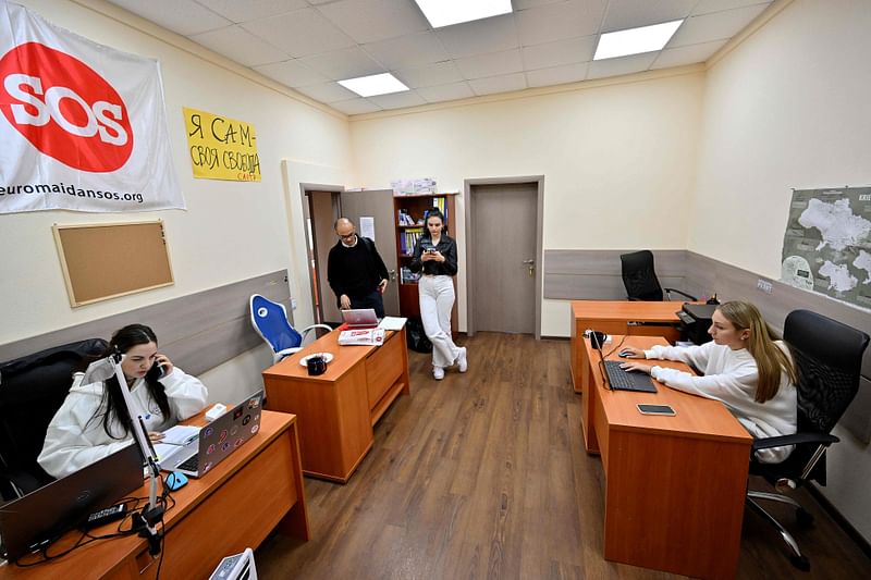 Employees of the Ukraine's Center for Civil Liberties work in the office in Kyiv on 7 October 2022.