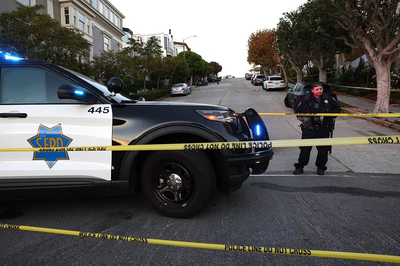 A San Francisco police officer stands guard in front of the home of US Speaker of the House Nancy Pelosi (D-CA) on 28 October, 2022 in San Francisco, California