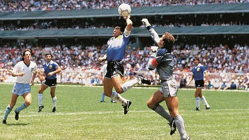 Diego Maradona scoring the 'Hand of God' goal against England in the 1986 World Cup quarterfinal.