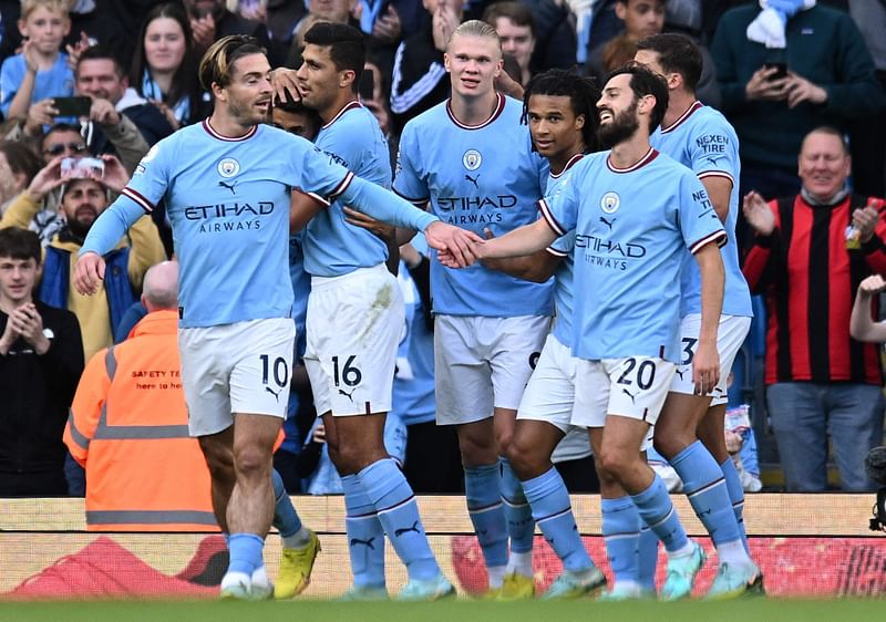 Manchester City's Norwegian striker Erling Haaland (C) celebrates scoring the team's fourth goal during the English Premier League football match between Manchester City and Southampton at the Etihad Stadium in Manchester, north west England, on 8 October, 2022