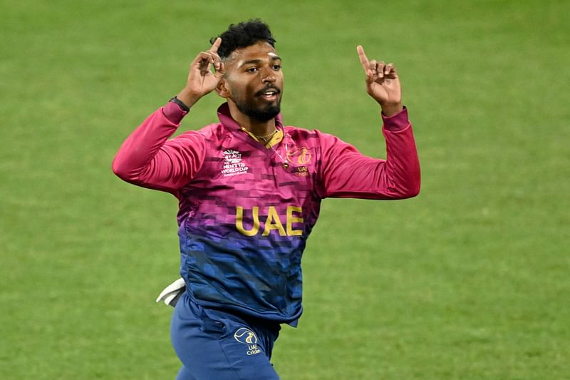 UAE's Karthik Palaniapan Meiyappan celebrates his hat-trick during the ICC men’s Twenty20 World Cup 2022 cricket match between Sri Lanka and United Arab Emirates at Kardinia Park in Geelong on 18 October, 2022