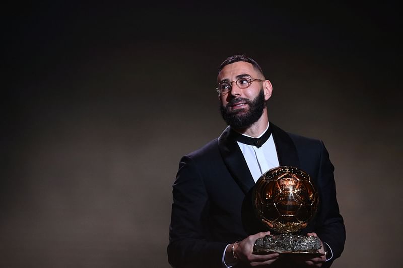 Real Madrid's French forward Karim Benzema receives the Ballon d'Or award during the 2022 Ballon d'Or France Football award ceremony at the Theatre du Chatelet in Paris on 17 October, 2022