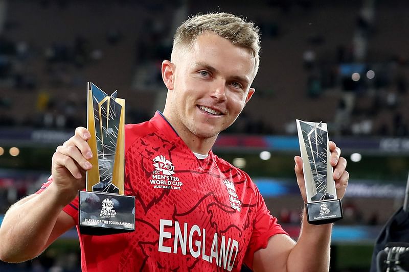 England's Sam Curran displays his trophies after the ICC men's Twenty20 World Cup 2022 Final between Pakistan and England at Melbourne Cricket Ground (MCG) in Melbourne on 13 November, 2022