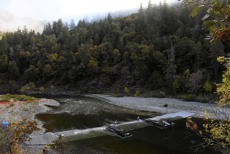 A weir, a non-lethal way to catch fish and run by the Hoopa Valley tribe, stretches across the Trinity River on the Hoopa Valley Reservation in Hoopa, California in the United States, on 15 October, 2021.