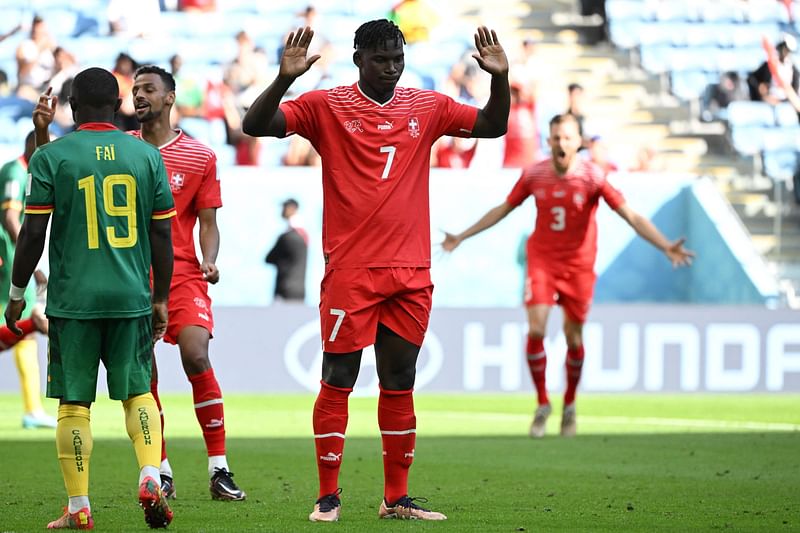 Switzerland's forward Breel Embolo reacts during the Qatar 2022 World Cup Group G football match between Switzerland and Cameroon at the Al-Janoub Stadium in Al-Wakrah, south of Doha on 24 November, 2022