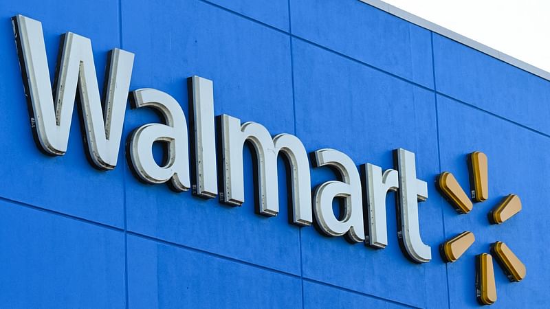 In this file photo taken on 15 August, 2022 the Walmart logo is seen outside a Walmart store in Burbank, California