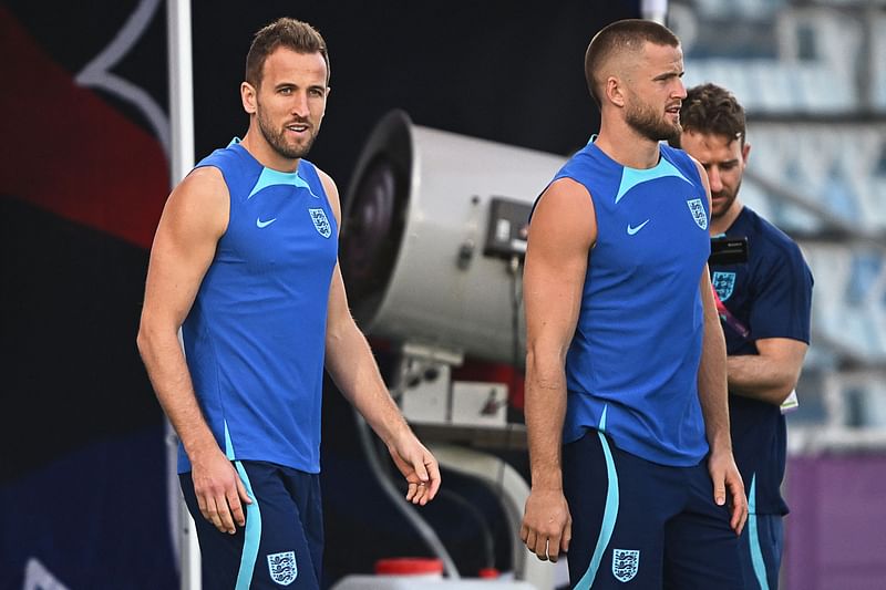 England's forward Harry Kane (C) and England's midfielder Jordan Henderson (L) take part in a training session at the Al Wakrah SC Stadium in Al Wakrah, south of Doha, on 20 November, 2022