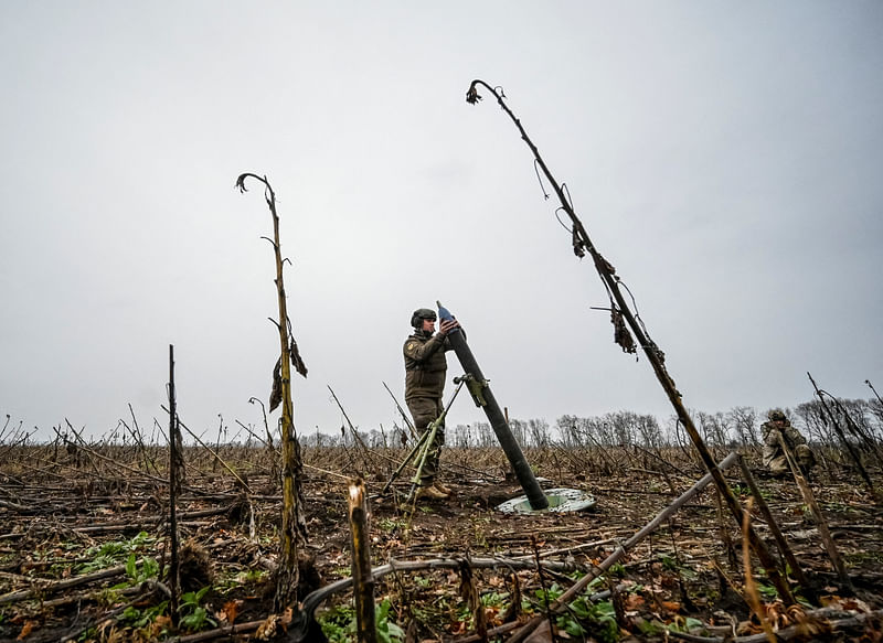 A Ukrainian serviceman fires a mortar on a front line, as Russia’s attack on Ukraine continues, in Zaporizhzhia region, Ukraine on 16 November, 2022