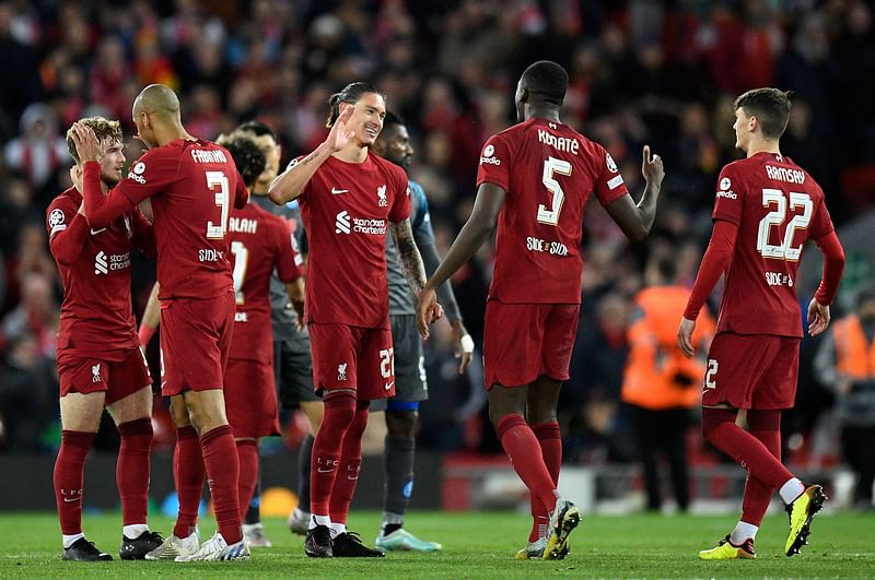 Liverpool's Uruguayan striker Darwin Nunez celebrates with teammates after the final whistle of the UEFA Champions League group A match between Liverpool and Napoli in Liverpool, north west England on 1 November, 2022