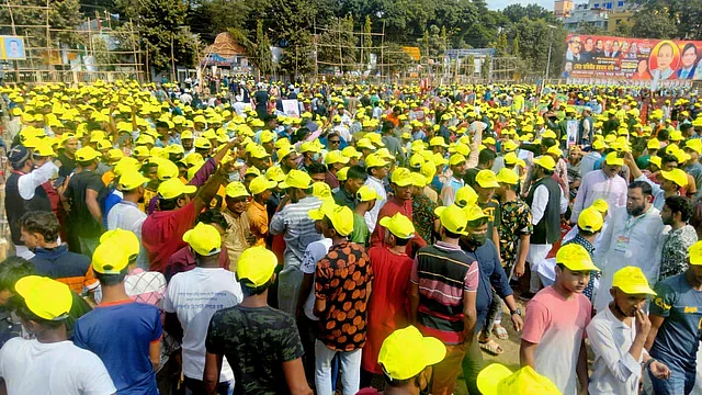 Awami League leaders and activists wearing colourful T-shirts and caps attend at the council of Gazipur city AL council.