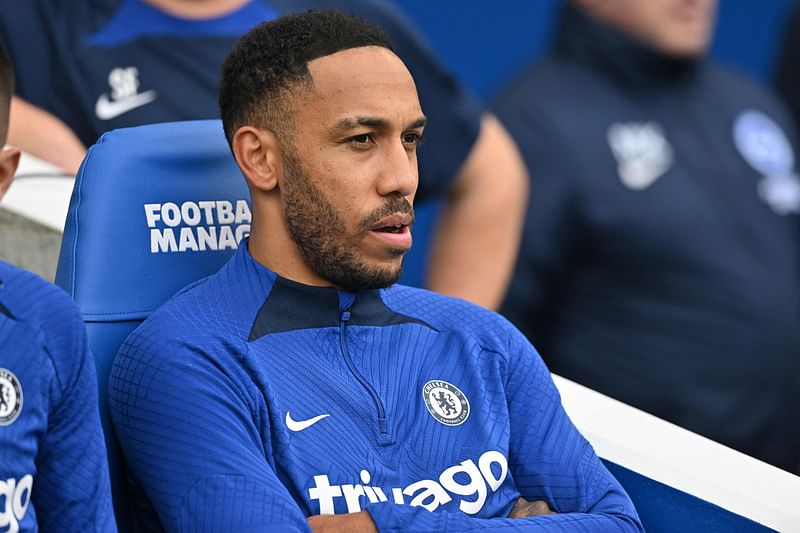 Chelsea's Gabonese striker Pierre-Emerick Aubameyang looks on from the bench ahead of the English Premier League match between Brighton and Hove Albion and Chelsea at the American Express Community Stadium in Brighton, southern England on 29 October, 2022