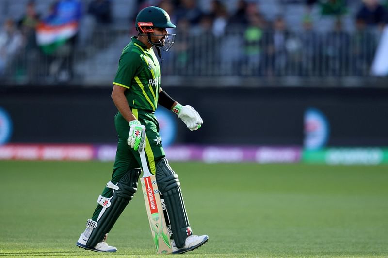 Pakistan's Captain Babar Azam walks off the field after his dismissal during the ICC men's Twenty20 World Cup 2022 cricket match between Pakistan and Netherlands at the Perth Stadium on 30 October, 2022