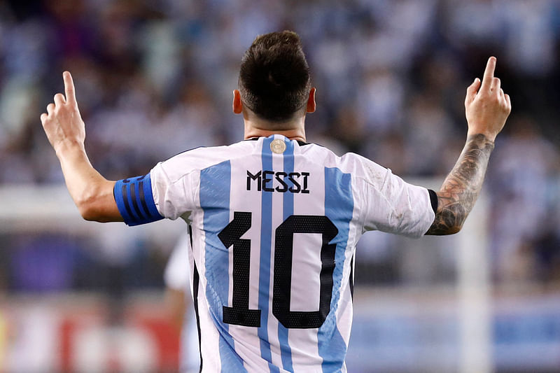 In this file photo taken on 28 September, 2022, Argentina's Lionel Messi celebrates his goal during the international friendly football match between Argentina and Jamaica at Red Bull Arena in Harrison, New Jersey