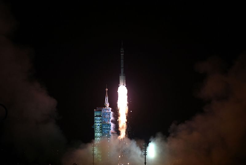 A Long March-2F carrier rocket, carrying the Shenzhou-15 spacecraft with three astronauts to China's Tiangong space station, lifts off from the Jiuquan Satellite Launch Center in Northwest China’s Gansu Province late on 29 November, 2022