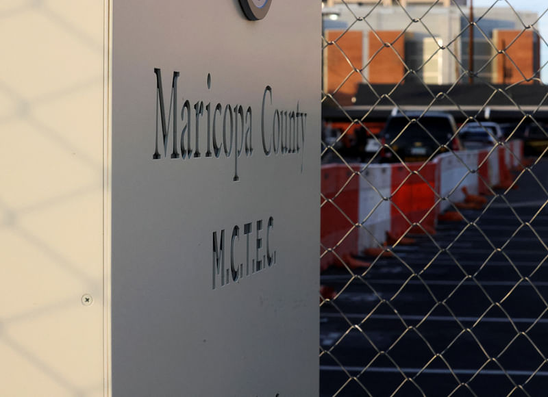 A temporary security fence surrounds the grounds of the Maricopa County Tabulation and Election Center as vote counting continues in Phoenix, Arizona, US, on 11 November, 2022.