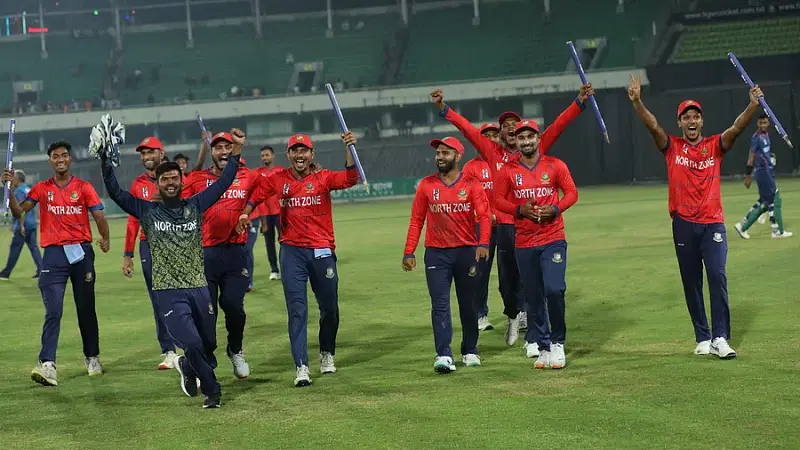 BCB North Zone players celebrate after defeating BCB South Zone in the final of the Bangladesh Cricket League at the Sher-e-Bangla National Cricket Stadium in Dhaka on 27 November, 2022