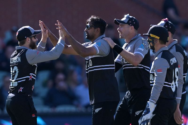 New Zealand's Ish Sodhi (C) celebrates his wicket of Ireland's Paul Stirling with teammates during the ICC men's Twenty20 World Cup 2022 match between New Zealand and Ireland at Adelaide Oval on 5 November, 2022 in Adelaide