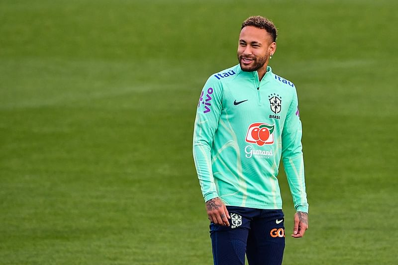 Brazil's forward Neymar smiles during a training session on November 17, 2022 at the Continassa training ground in Turin, as part of Brazil's preparation ahead of the Qatar 2022 World Cup