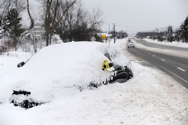 A car is abandoned along Southwestern Boulevard on 26 December, 2022 in West Seneca, New York