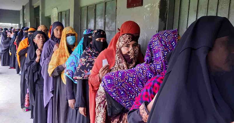 A queue of female voters at a centre