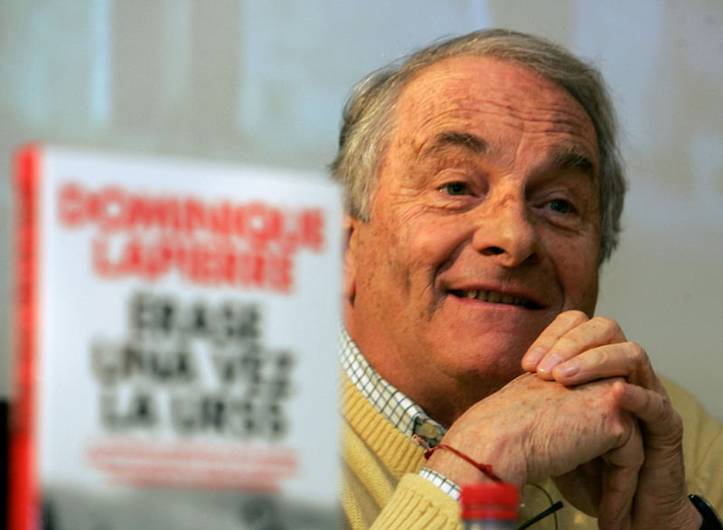 In this file photo taken on 18 January, 2006 French author Dominique Lapierre speaks at a press conference to promote the Spanish translation of his book 'Once upon a time in the USSR' in Madrid.