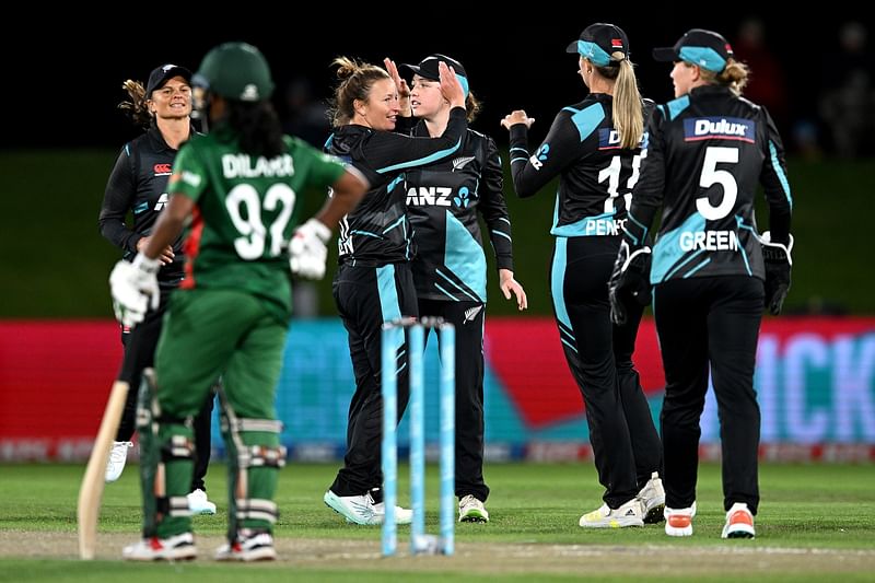 New Zealand women's team celebrate the fall of another Bangladesh wicket at the Hagley Oval in Christchurch, New Zealand on 2 December, 2022