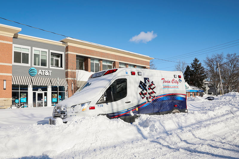 An Ambulance is left stranded on the road following a winter storm that hit the Buffalo region on Main St. in Amherst, New York, US, December 25, 2022