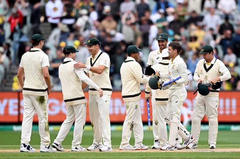 The Australian team walks off after defeating South Africa on the fourth day of the second cricket Test match between Australia and South Africa at the MCG in Melbourne on 29 December, 2022