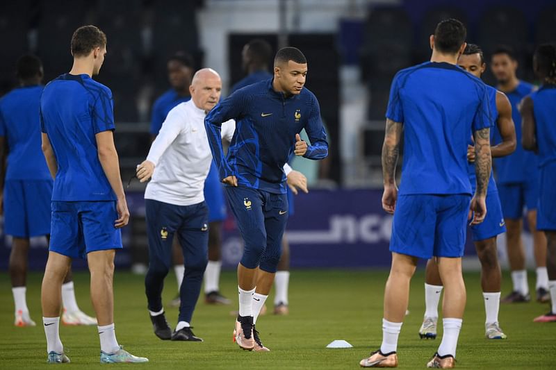 France's forward #10 Kylian Mbappe (C) takes part in a training session at the Al Sadd SC training centre in Doha on 17 December, 2022, on the eve of the Qatar 2022 World Cup football final match between Argentina and France