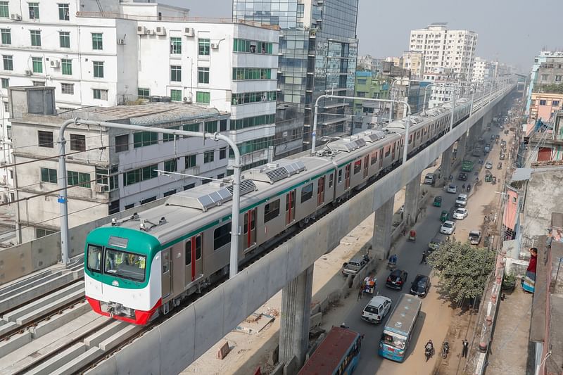 Photo shows trial run of metro rail on Diabari-Agargaon route. This picture was taken from Taltala, Mirpur, Dhaka on 12 December 2022.