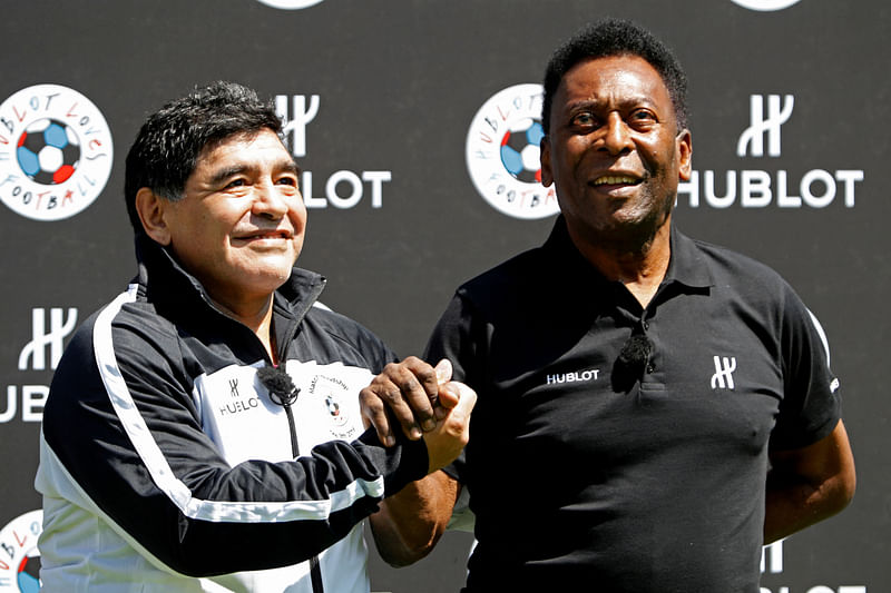 Football legends Pele and Diego Maradona attend an advertising football event on the eve of the opening of the UEFA 2016 European Championship in Paris, France on 9 June, 2016