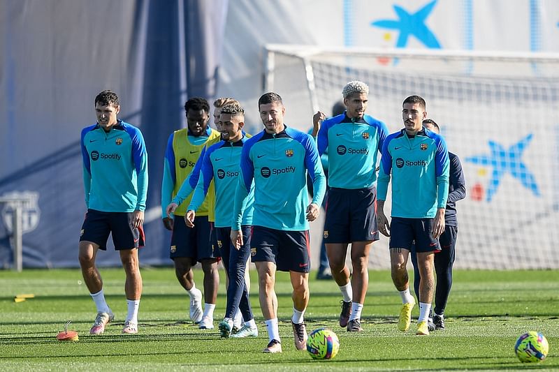 Barcelona's Polish forward Robert Lewandowski and teammates take part in a training session at the Joan Gamper training ground in Sant Joan Despi, near Barcelona, on 23 December, 2022