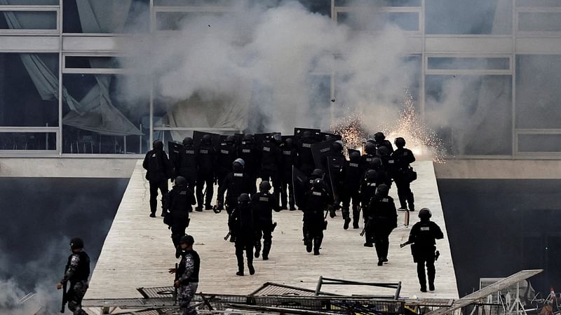 Security forces operate as supporters of Brazil’s former president Jair Bolsonaro demonstrate against President Luiz Inacio Lula da Silva, in Planalto Palace, in Brasilia, Brazil, on 8 January, 2023