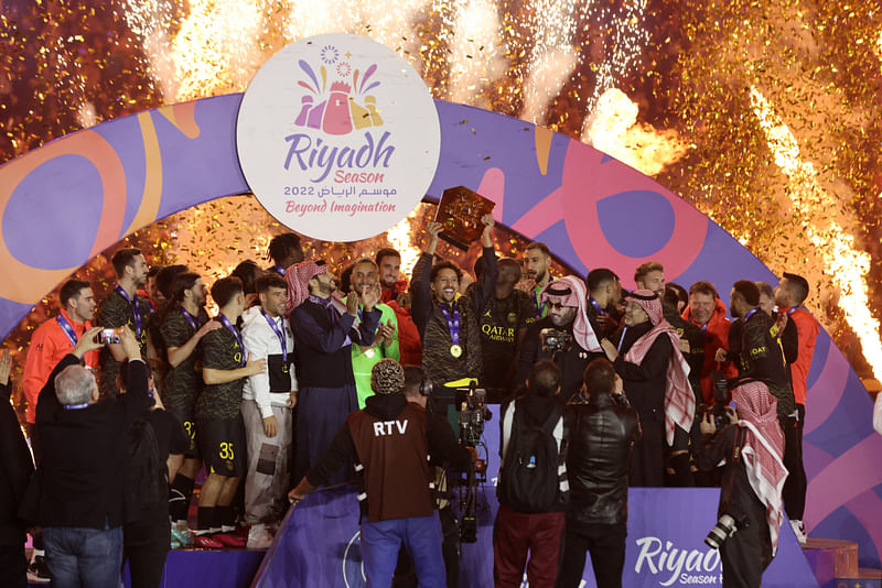 Paris St Germain’s Marquinhos celebrates with a trophy and teammates winning the friendly football match between Saudi Pro League XI and Paris St Germain at King Fahd International Stadium, Riyadh, Saudia Arabia on 19 January, 2023