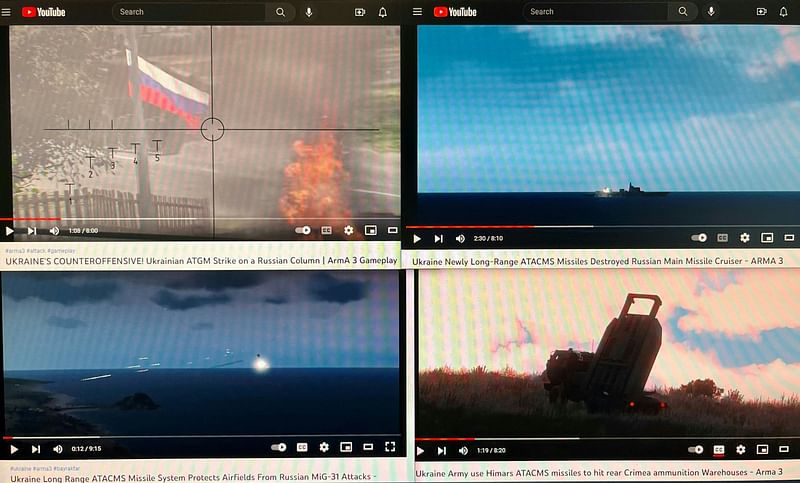 Photo illustration generated in an office in Washington, DC on 28 December, 2022, shows a computer screen with four YouTube windows displaying combat clips from Arma 3's war-themed video games. Footage from video game, often marked "live" or "breaking news" to make it appear genuine, has been used repeatedly in recent months in fake videos about the Russian offensive in Ukraine.