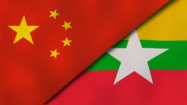 This picture shows flags of Myanmar and China