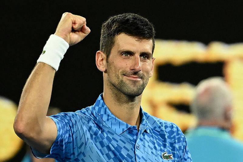 Serbia's Novak Djokovic celebrates victory against Australia's Alex De Minaur during their men's singles match on day eight of the Australian Open in Melbourne on 23 January, 2023