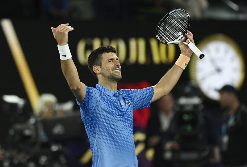 Serbia's Novak Djokovic celebrates winning his final match against Greece's Stefanos Tsitsipas at the Australian Open men's singles final at the Melbourne Park in Melbourne, Australia on 29 January, 2023