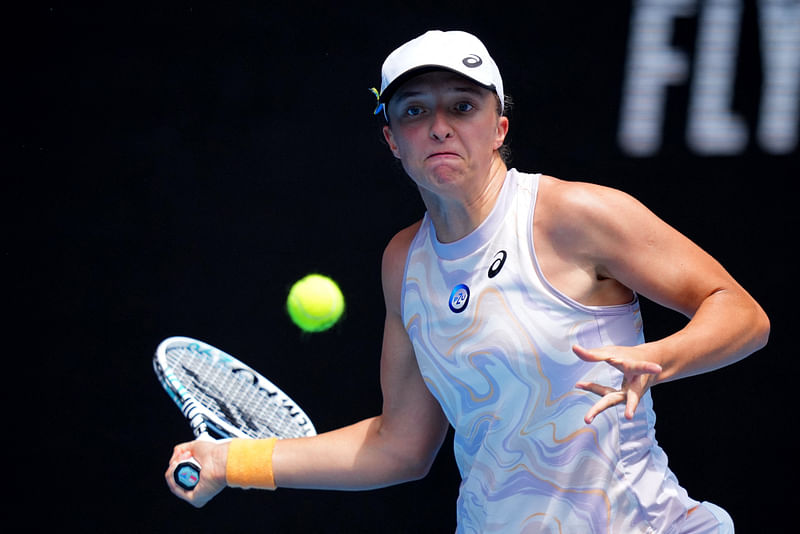 Poland's Iga Swiatek in action during her fourth round match against Kazakhstan's Elena Rybakina on 22 January, 2023