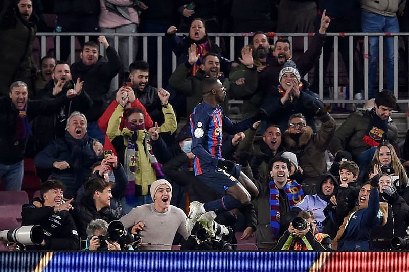 Barcelona's French forward Ousmane Dembele celebrates scoring his team's first goal during the Copa del Rey (King's Cup), quarter final football match between FC Barcelona and Real Sociedad, at the Camp Nou stadium in Barcelona on 25 January, 2023