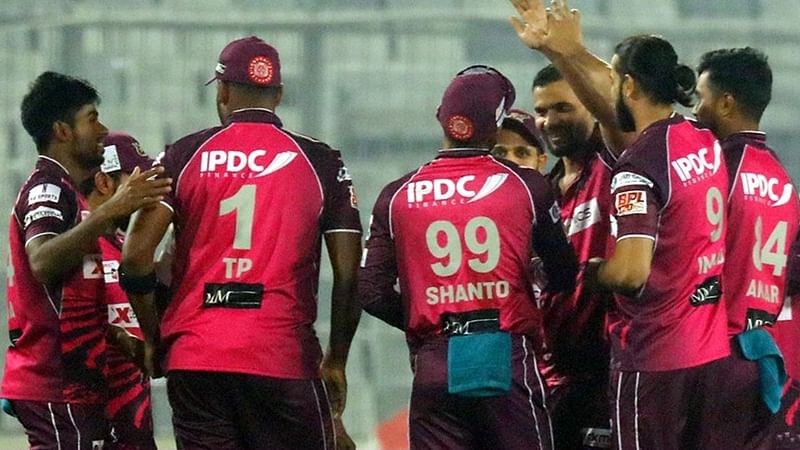 Sylhet Strikers players celebrate the fall of a wicket against Dhaka Dominators in their ninth Bangladesh Premier League match at the Sher-e-Bangla National Cricket Stadium in Dhaka on 10 January, 2023