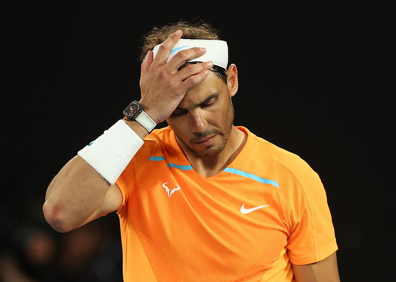 Spain's Rafael Nadal looks dejected after losing his second round match against Mackenzie Mcdonald at the Australian Open 2023