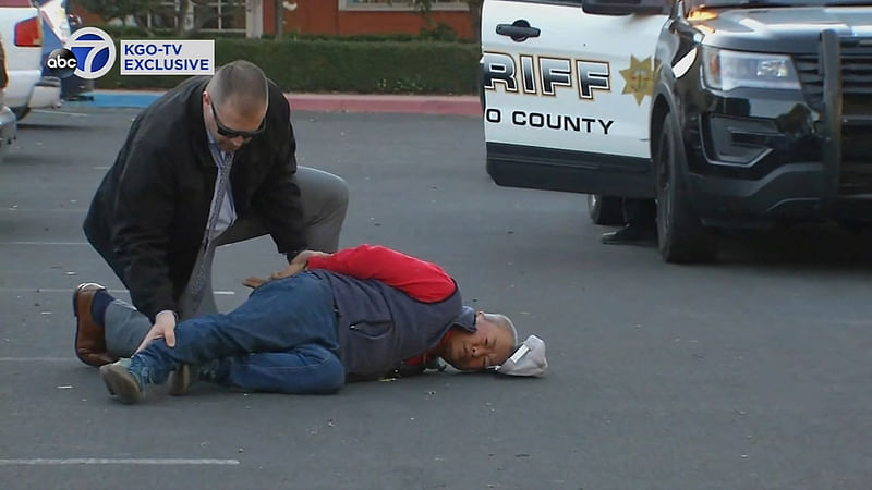 A suspect is arrested by law enforcement personnel after a mass shooting at two locations in the coastal northern California city of Half Moon Bay, California, U.S. January 23, 2023 in a still image from video