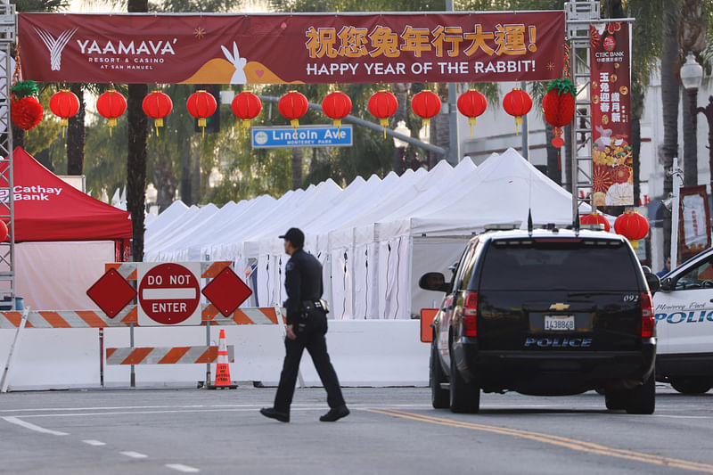 A police officer walks near the location of a mass shooting during Chinese Lunar New Year celebrations in Monterey Park, California, US January 22, 2023